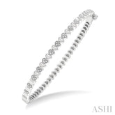 1/6 ctw Puffed Heart Plain and Round Cut Diamond Bangle in Sterling Silver